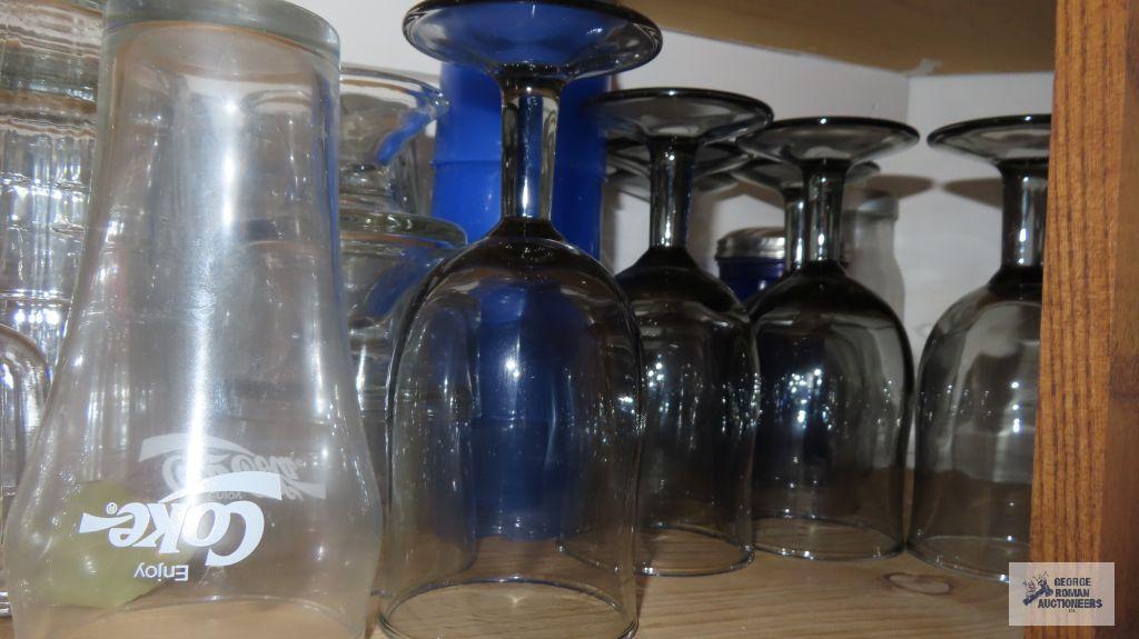 Cupboard lot of assorted glassware and frosted mugs