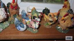 Windowsill full of chicken and rooster figurines