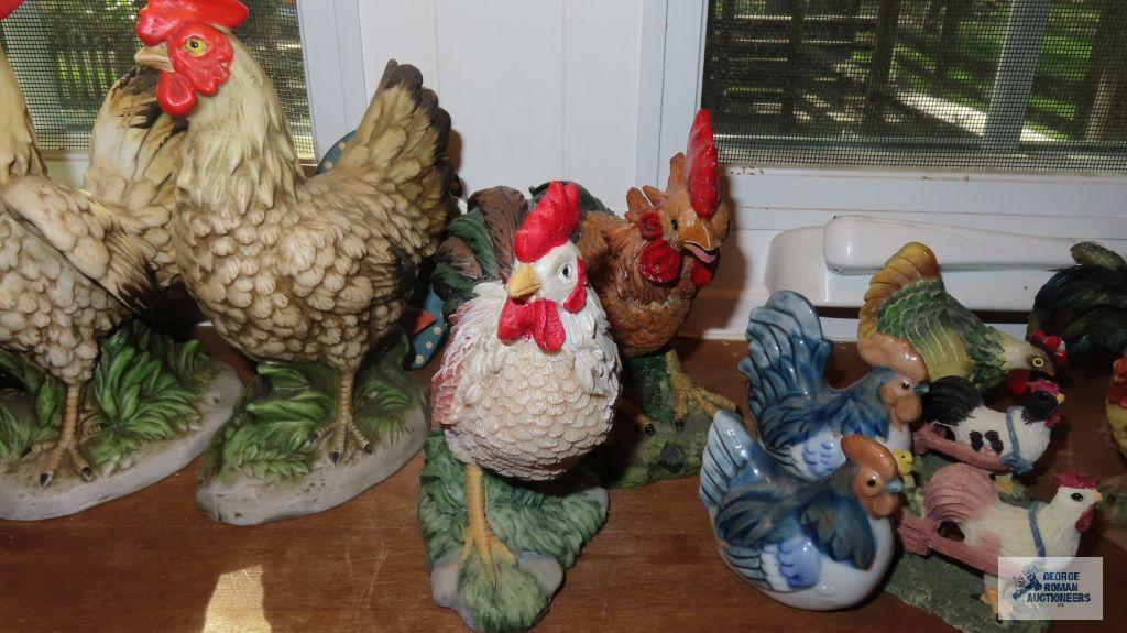 Windowsill full of chicken and rooster figurines