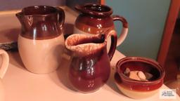 Pottery pitchers