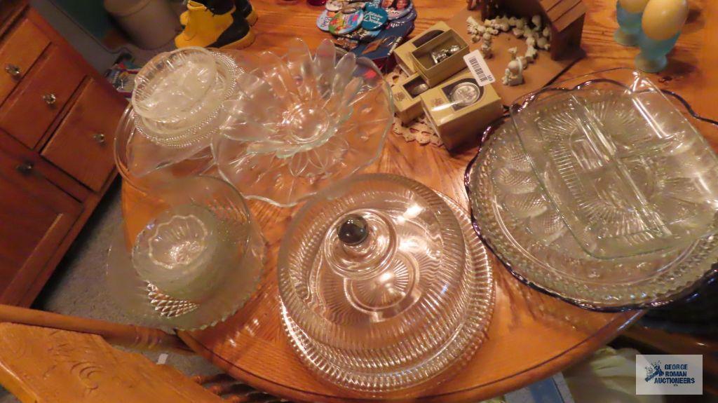 Lot of glassware, including salad bowl set. Cake stands. Covered cake dish. Serving platters.