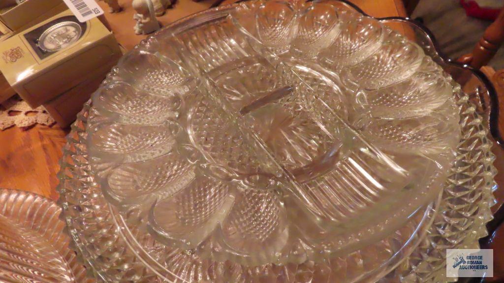 Lot of glassware, including salad bowl set. Cake stands. Covered cake dish. Serving platters.