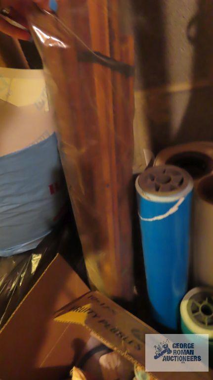 rolls of paper, unassemble wooden rack and etc