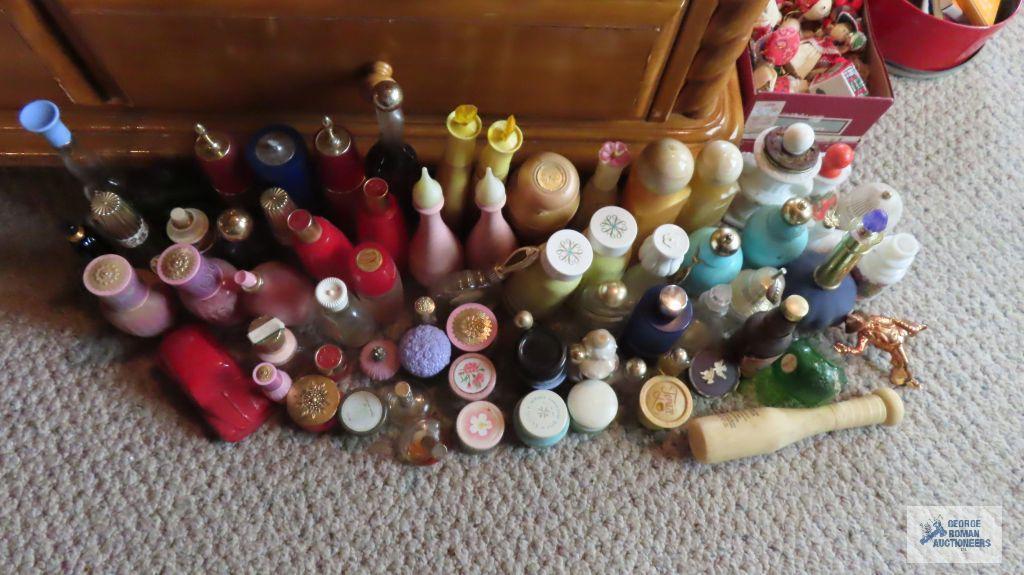 Large number of Avon bottles and figurine bottles