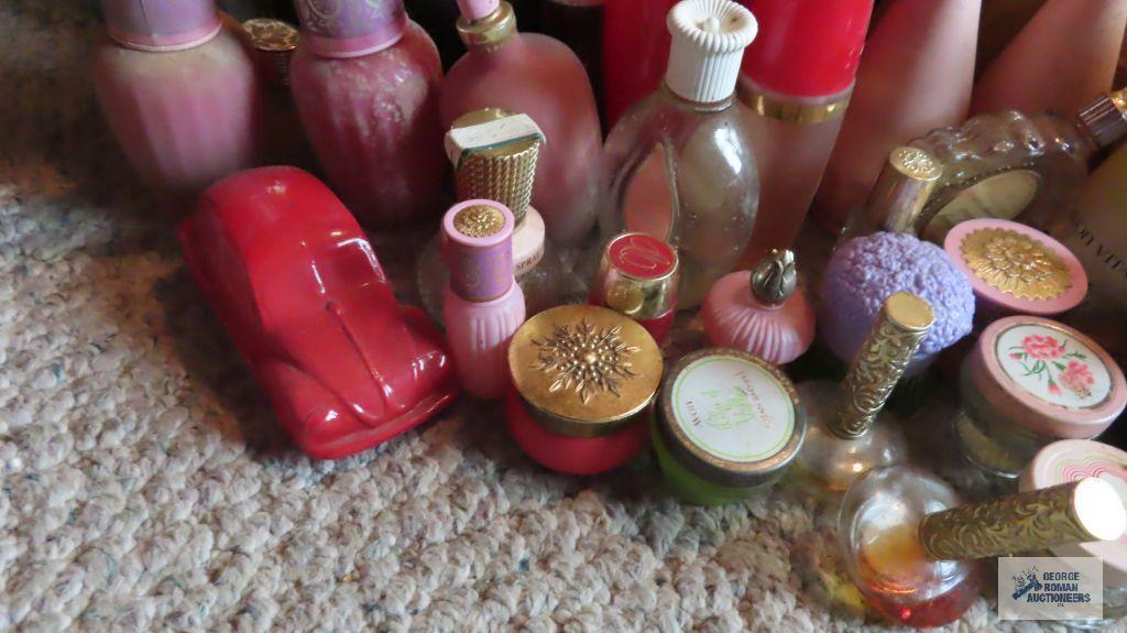 Large number of Avon bottles and figurine bottles