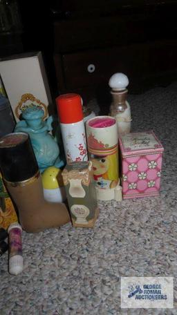 Assorted Avon bottles and items