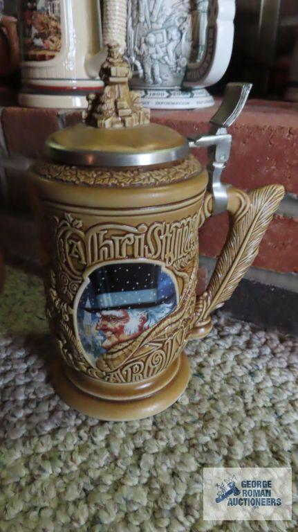 Two Avon Christmas steins