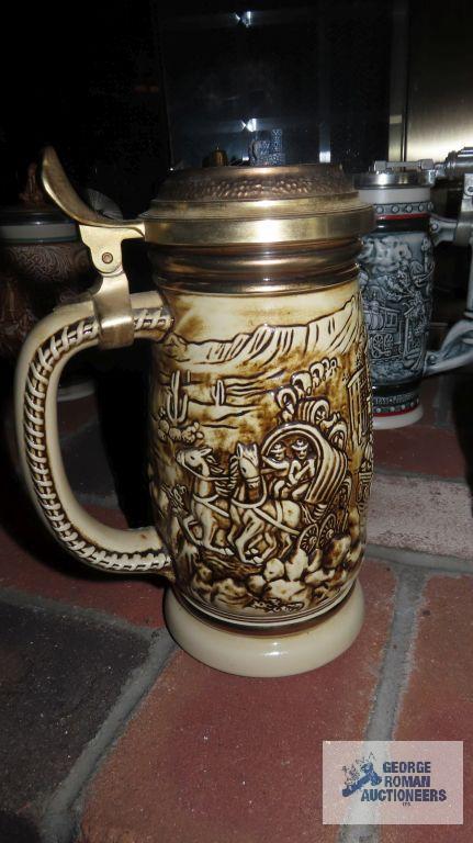 Three Avon steins