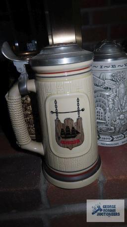 Three Avon steins