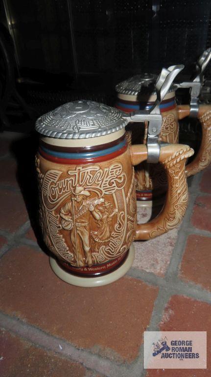 Three Avon steins