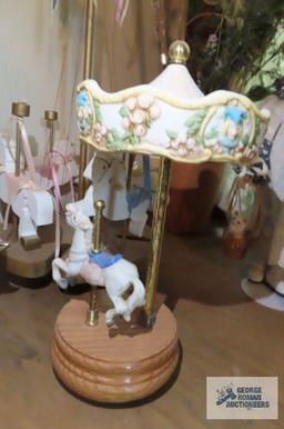 Porcelain carousel music box, metal carousel, and wooden carousel