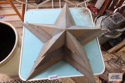 Wooden and metal outdoor table with star decorations