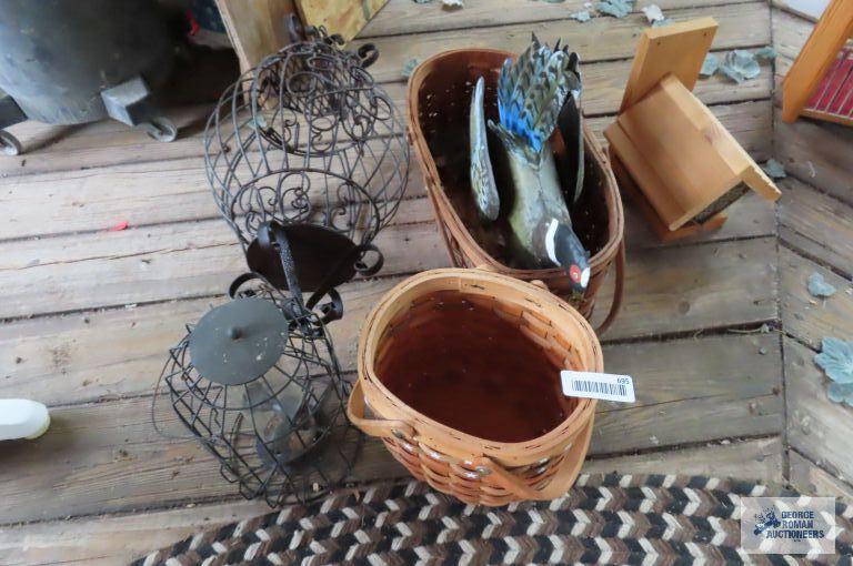 Lot of baskets, rooster figurine, and bird feeders