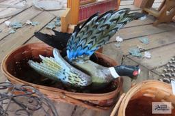Lot of baskets, rooster figurine, and bird feeders