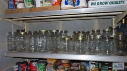 One shlef of assorted jars and bottles