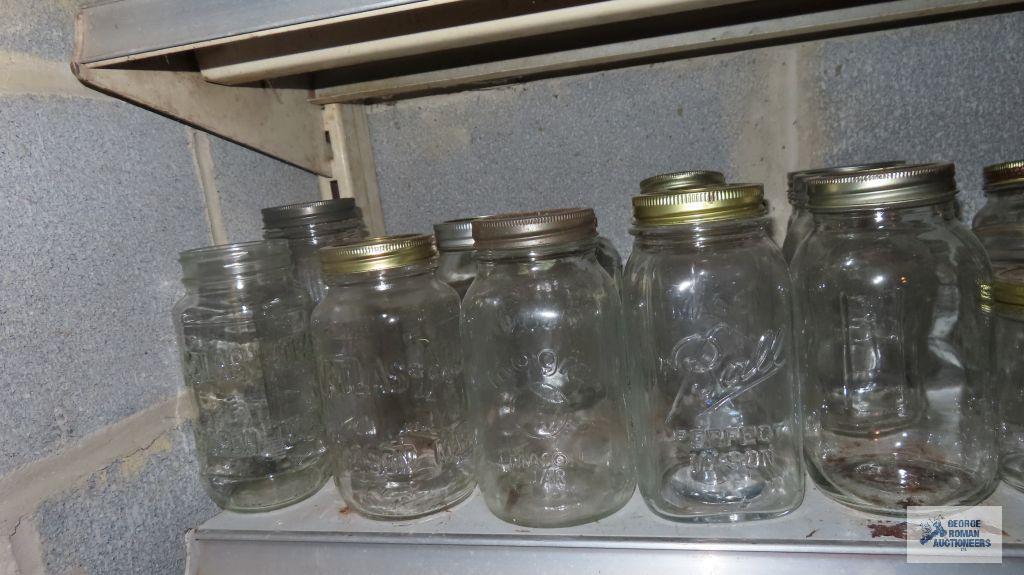One shlef of assorted jars and bottles