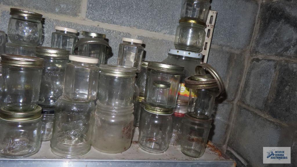 One shlef of assorted jars and bottles