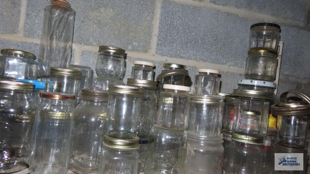 One shlef of assorted jars and bottles