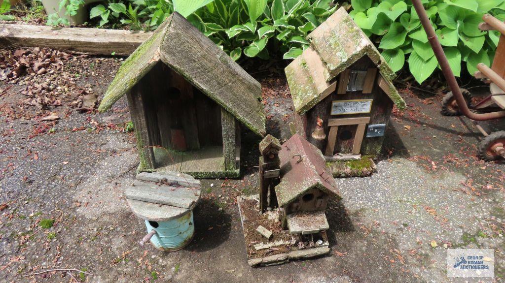 Lot of rustic birdhouses