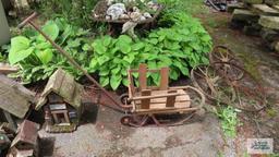 Vintage infant sled with wheels and handle