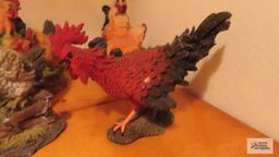 Assorted rooster and chicken figurines