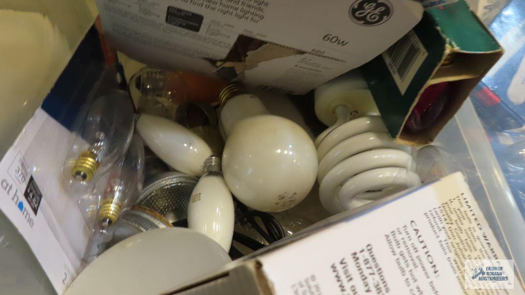 Assorted lightbulbs in totes