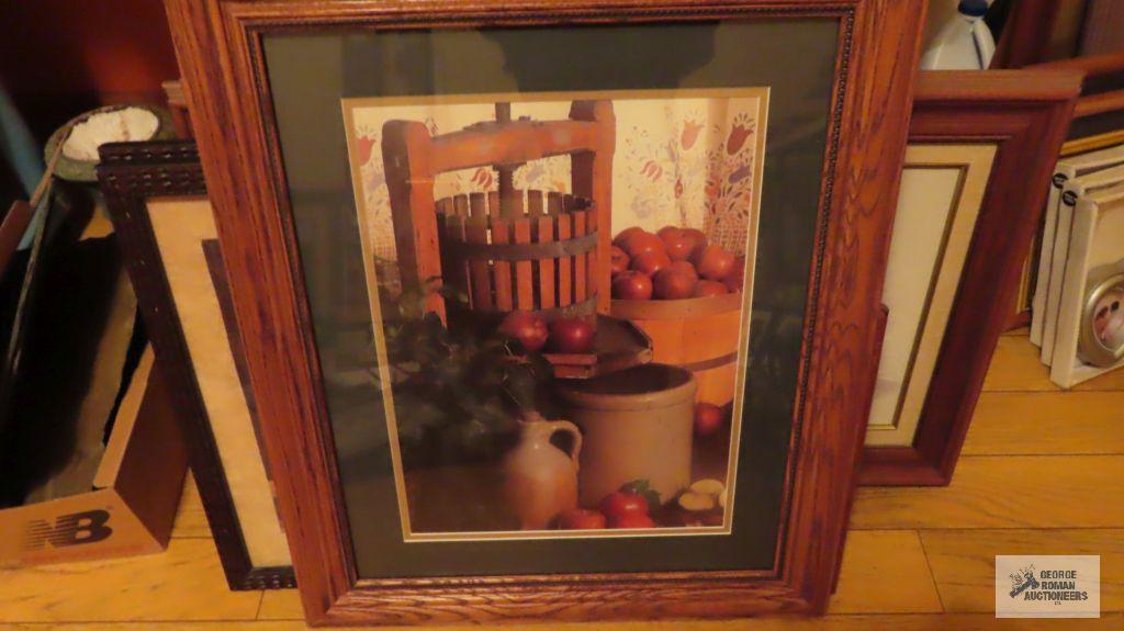 Assorted pictures with decorative frames