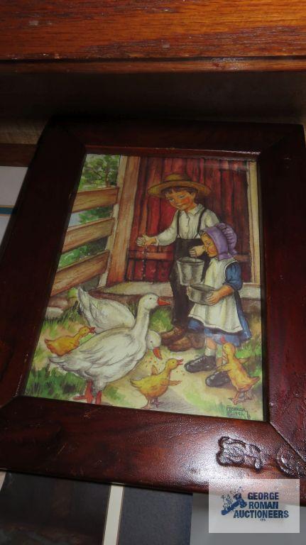 Variety of prints in frame, mostly concerning Amish lifestyle