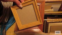 Variety of craft items and various frames. Includes rolling plastic storage cabinet