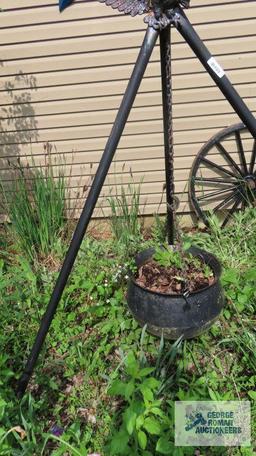 Cast iron cauldron with tripod