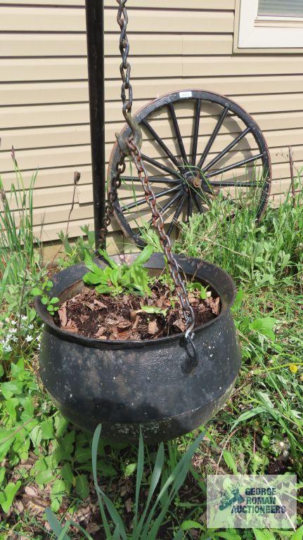 Cast iron cauldron with tripod