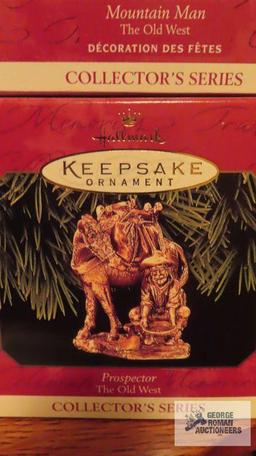 Three Hallmark keepsake ornaments of the old west collector series, including Prospector. Mountain