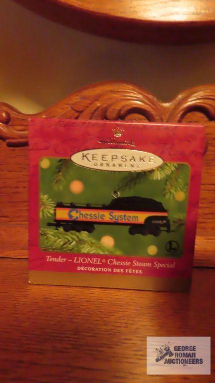 Six Hallmark keepsake ornaments dated 2000 and 2001