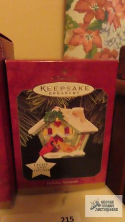 Four Hallmark keepsake ornaments that are musical