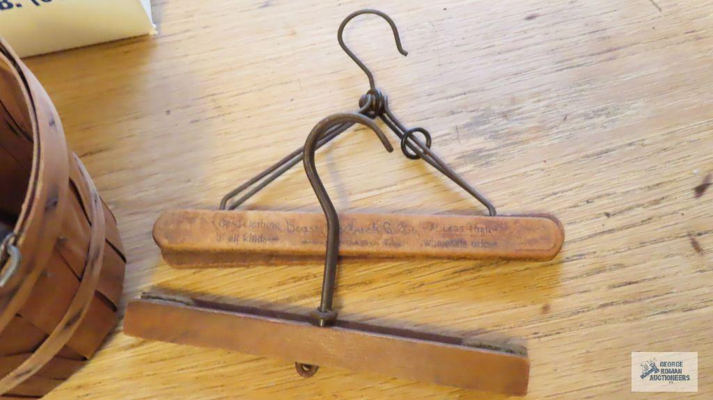 Vintage advertising hangers, basket, tin