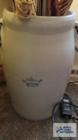 Crown 6 gallon crock with wire handles and contains reeds