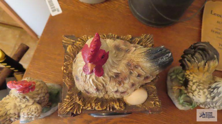 Chicken nest clock and two rooster figurines