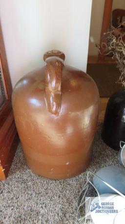 Large jug with broken cork in center