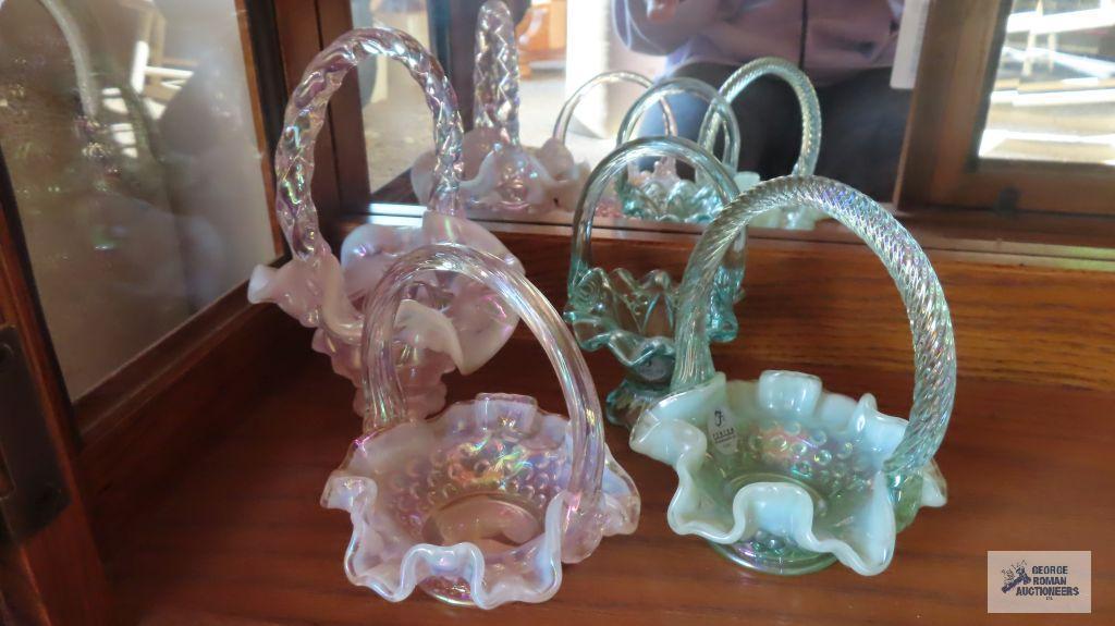 Four small Fenton baskets