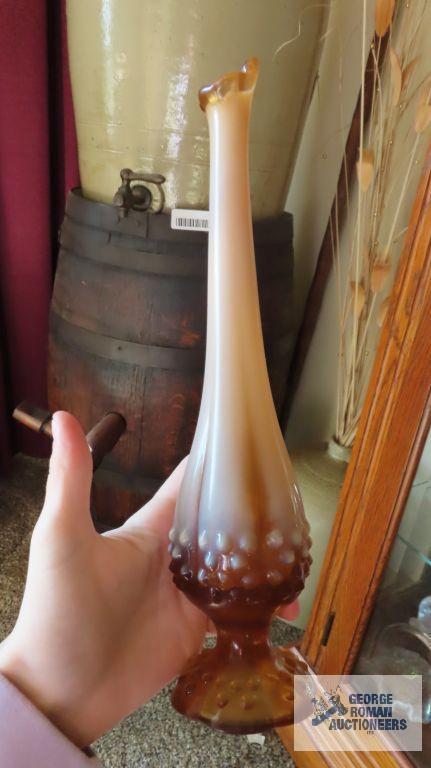 Two vases. One is a frosted swung vase and the other is a milk glass edged vase.