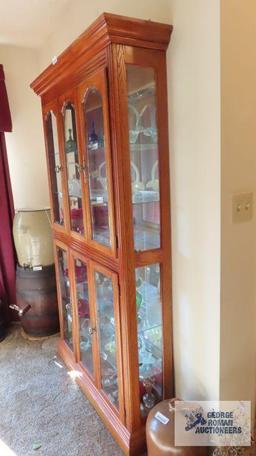 Oak lighted curio cabinet, all glass sides