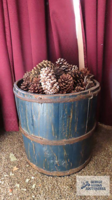 Wooden barrel of cones with handle