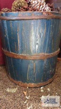 Wooden barrel of cones with handle