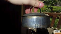 Tin container with handle, lid and spout