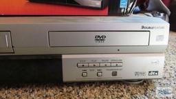 Sony DVD player in box and Panasonic VHS DVD player