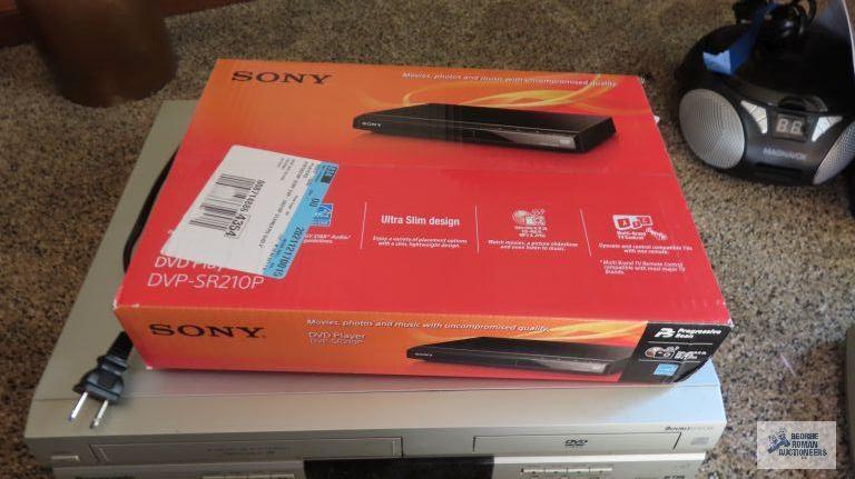 Sony DVD player in box and Panasonic VHS DVD player