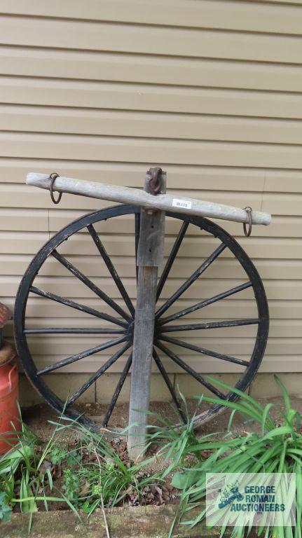 Double tree with antique wagon wheel