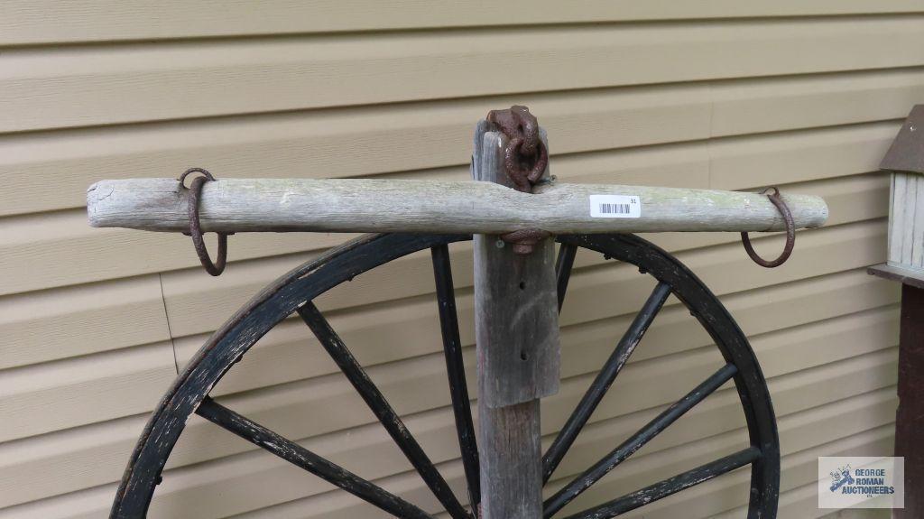 Double tree with antique wagon wheel