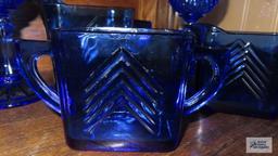 Cobalt blue creamer and sugars and blue goblets