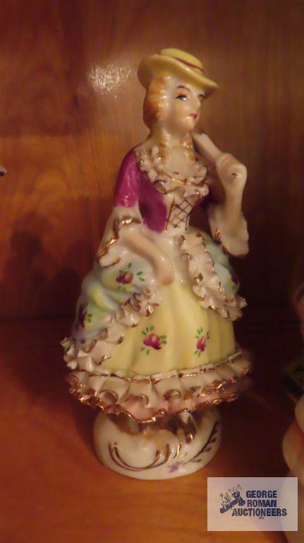 Victorian figurines, small trinket boxes, and vases